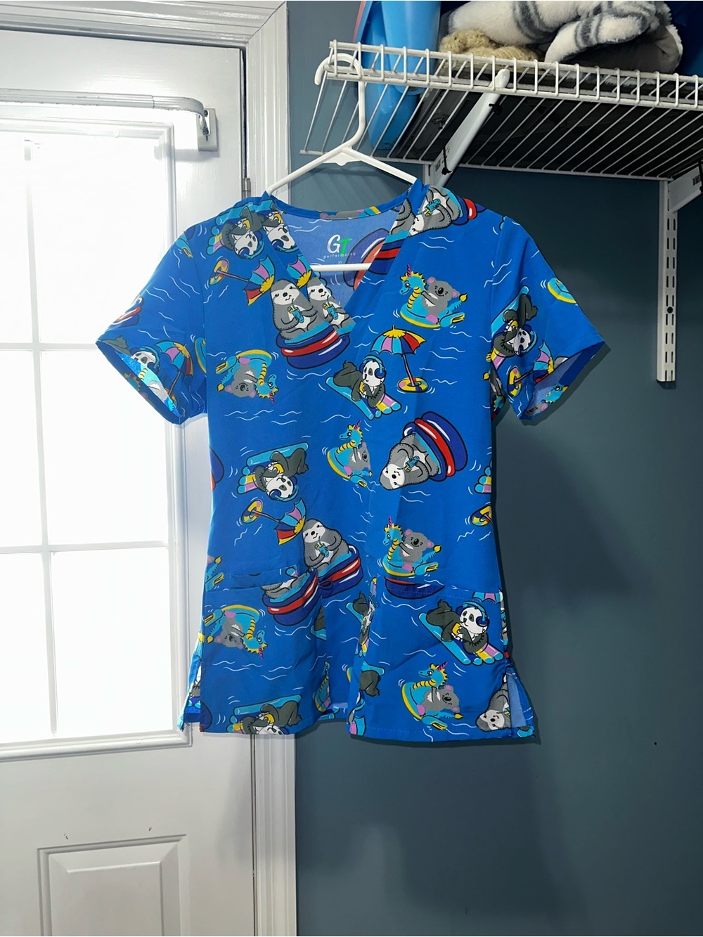 Blue Women's Short Sleeve Peplum Top with Playful Animal Print